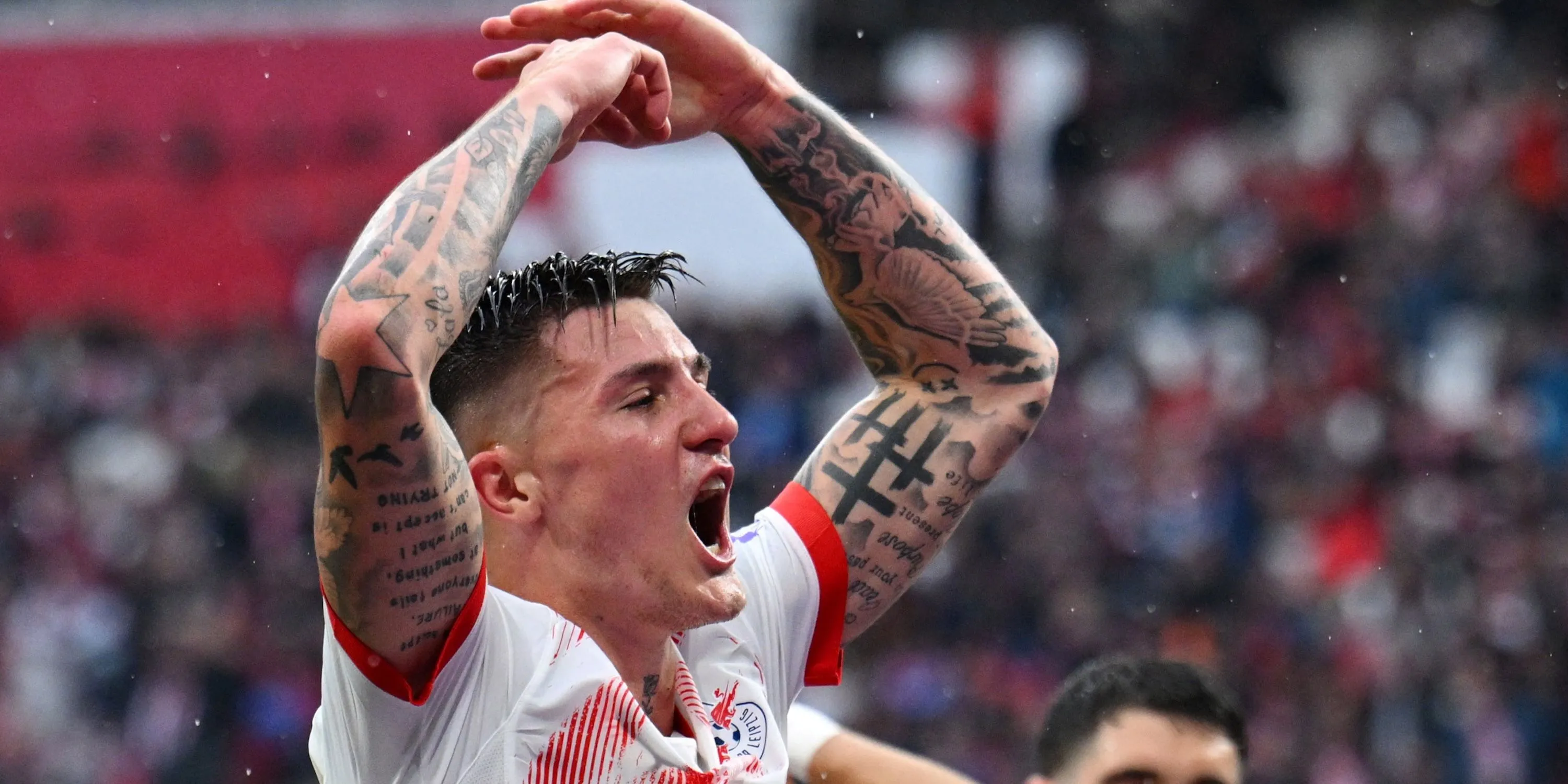 Tiền đạo Benjamin Sesko của RB Leipzig ăn mừng